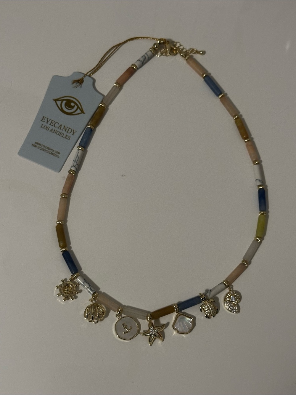 Eye Candy Los Angeles Gold Sea Charm Necklace with Blue, Gray and Tan Beads - Picture 7 of 7